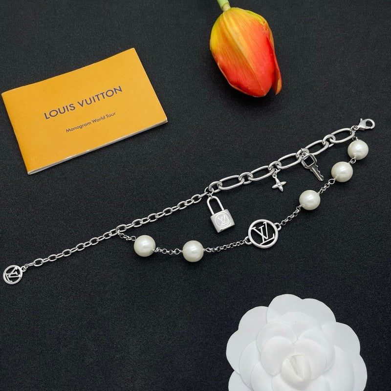 18K Louis Vuitton Pearl Lock Gold Bracelet