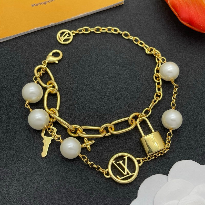 18K Louis Vuitton Pearl Lock Gold Bracelet